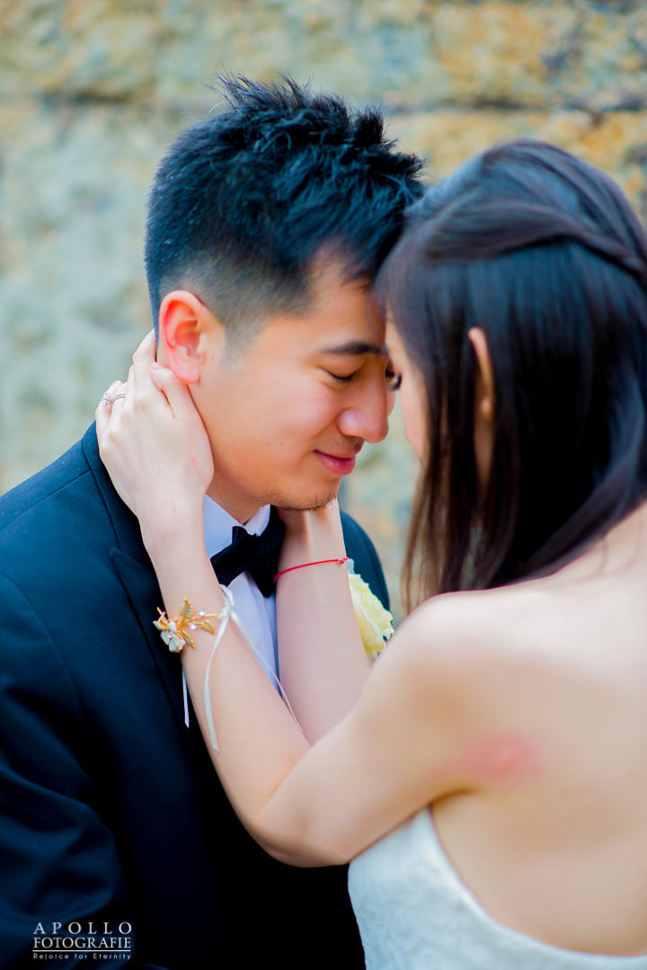 bride and groom embrace